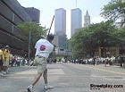 Stickball in shadow of Twin Towers