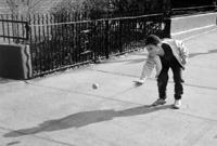 Boy playing box baseball