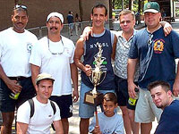 Steve accepts a trophy