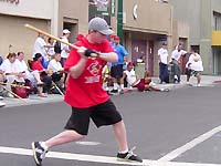 Stickball in the streets of Little Italy in San Diego Ca.
