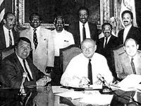 Mayor Koch signing proclamation officially creating Stickball Blvd in the Bronx - 1988