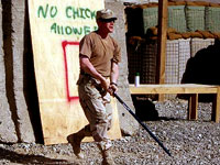 American troops playing stickball in Afghanistan