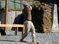 American troops playing stickball in Afghanistan